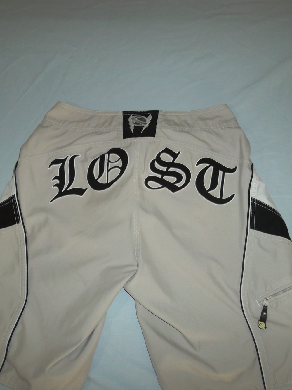 Vintage Y2K Lost Men's Beige and White Board Shorts with Black Trim